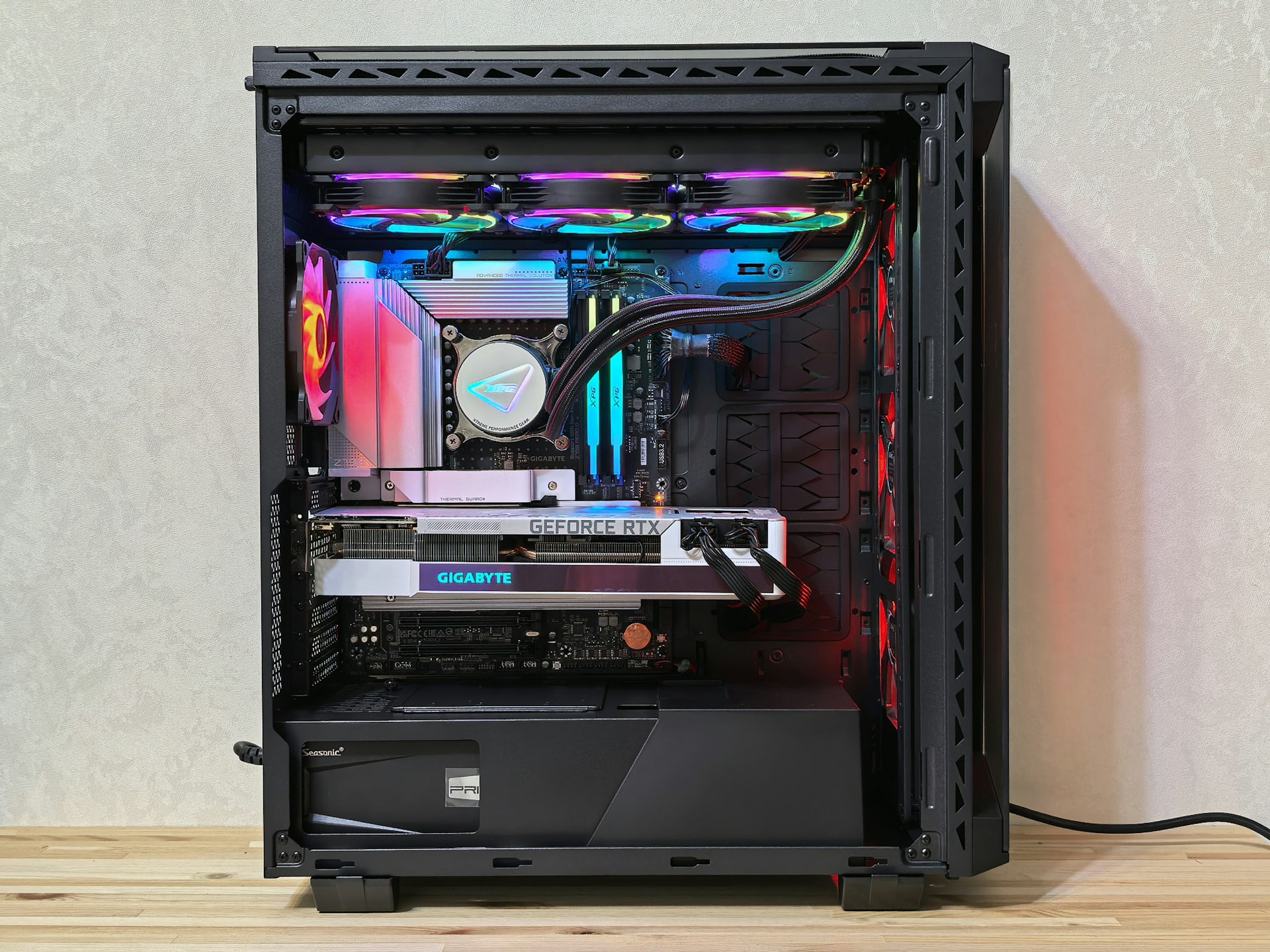 A modern computer tower with color-changing lights.